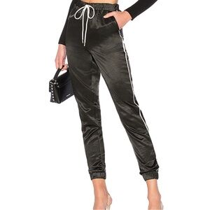 by the way. Black Joggers with White Side Stripes